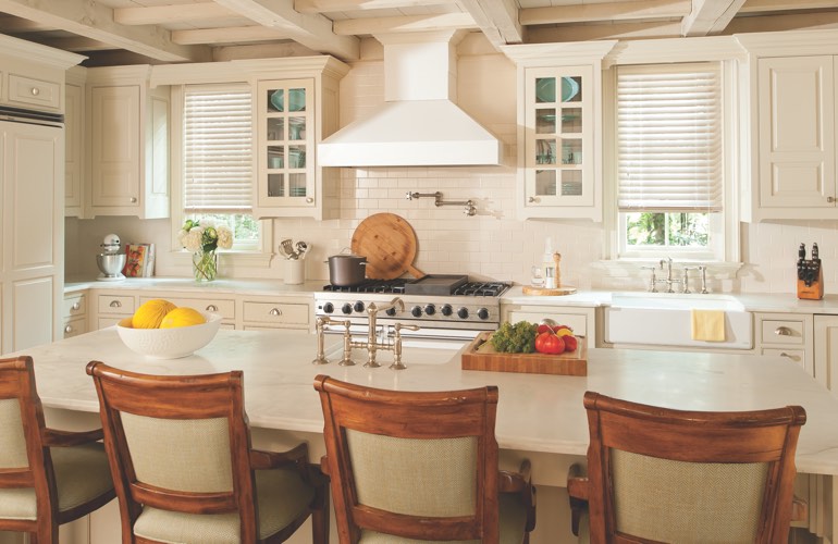 A modern kitchen with blinds